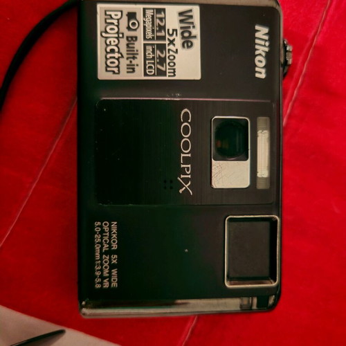 Nikon Coolpix S1000pj digital camera 12MP used with built-in projector