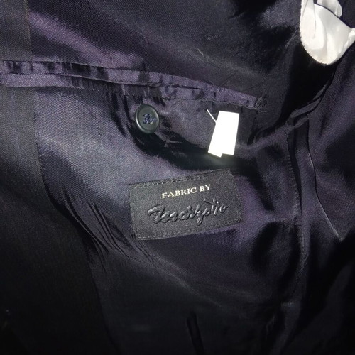 Glou suit used, size 48, dark blue with stripes