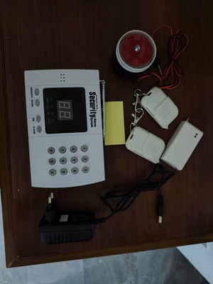 Home Security wireless alarm system like new with remote controls and siren