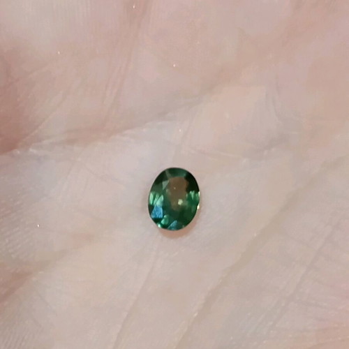 Natural bicolor sapphire 1.03 ct, oval, mixed cut, like new