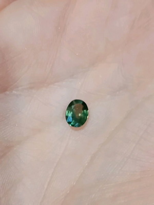 Natural bicolor sapphire 1.03 ct, oval, mixed cut, like new