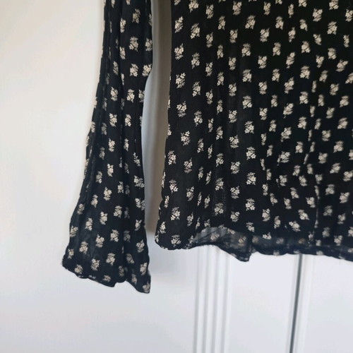 Egg shirt like new, transparent with floral pattern, size S