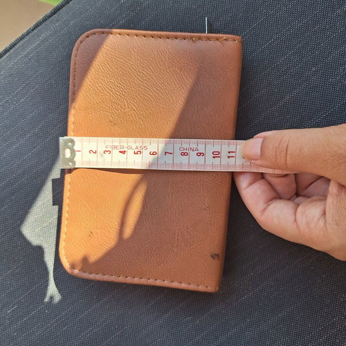 Skin and nail care tools set in small brown case