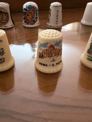 Collection of 12 collectible tourist thimbles