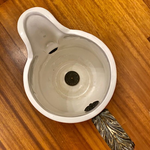 Decorative ceramic pitcher with brass fittings like new