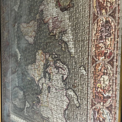 Old collectible holographic puzzle in frame