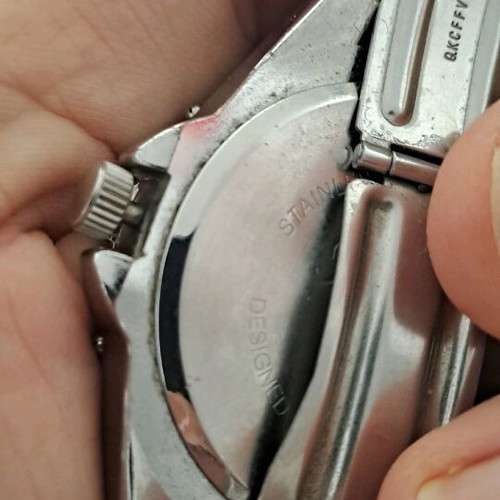 Regal wristwatch men's used, silver with blue decoration