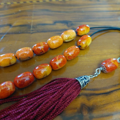 Worry beads from red coral root like new with 21+1 beads and silver elements