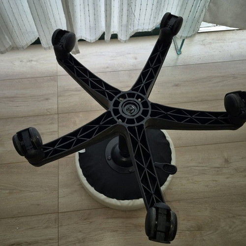 Rolling stool used with adjustable height and white leatherette