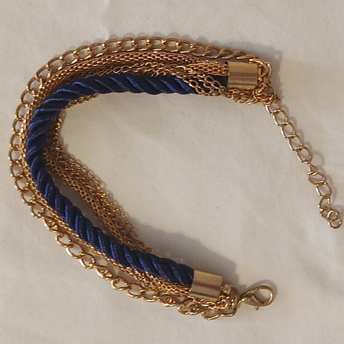 Women's bracelet with blue cord and gold chains, new