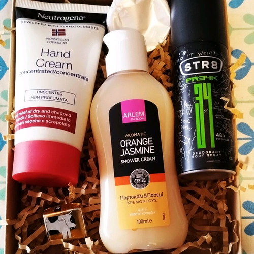 Gift box with new bath products Neutrogena, Farcom, Str8