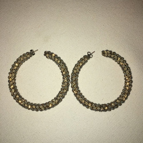 Swarovski stones used, large bronze hoop earrings with one missing stone