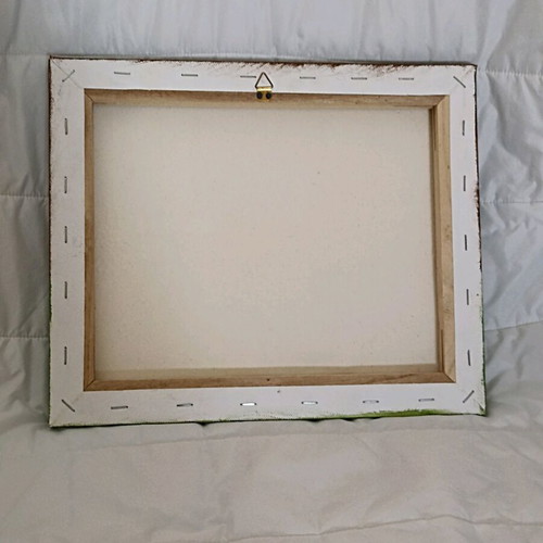 Handmade canvas art with snail and decorative stones