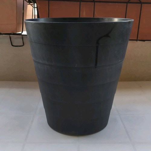 Plastic flowerpot used, black color, height 31 cm