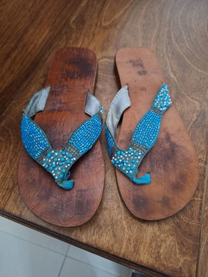 Women's leather handmade sandals used with blue beads