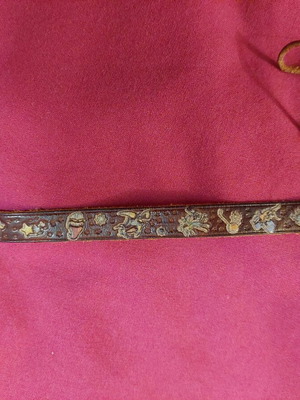Leather children's bracelet used brown tied with cord