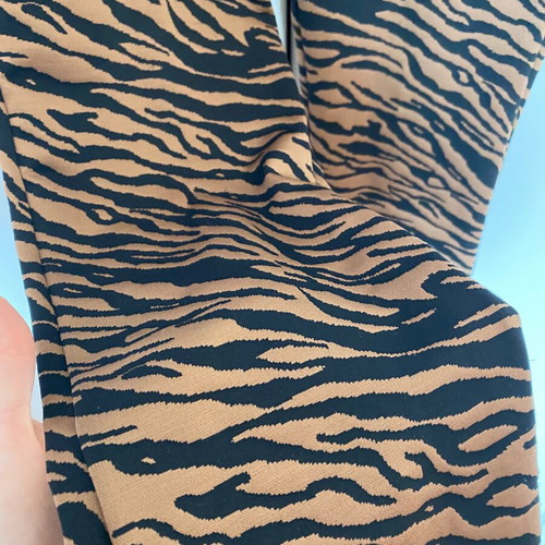 Zebra flare leggings used, brown, size S