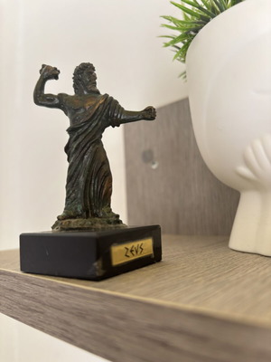Zeus figurine like new, heavy metal with patina on black base