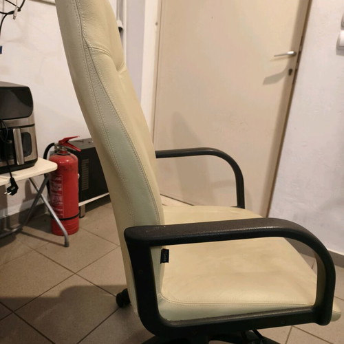 Office chair used with ergonomic position and height adjustment