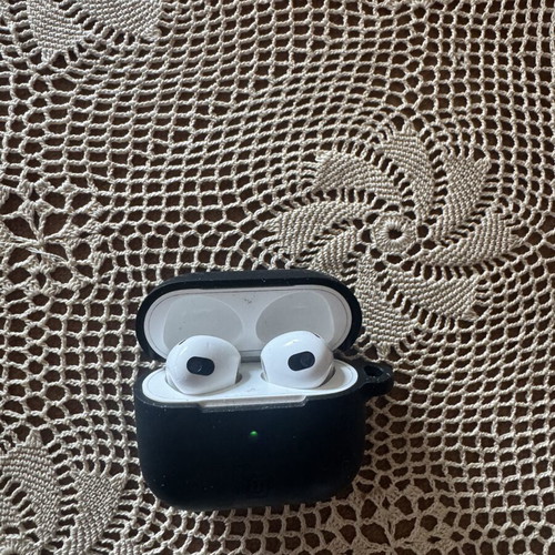 Apple AirPods 3rd Gen and Apple Watch SE 44mm used with accessories