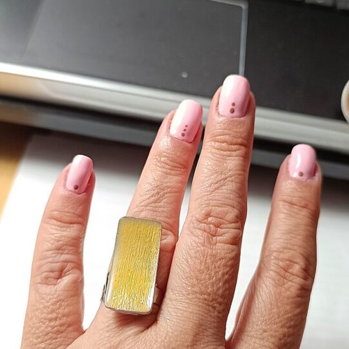 Ring with enamel in yellow and silver tones, new