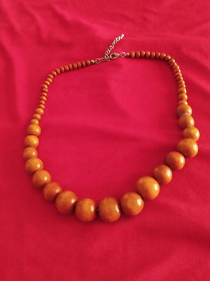 Wooden handmade necklaces, brown color