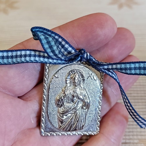 Silver-plated cradle icon