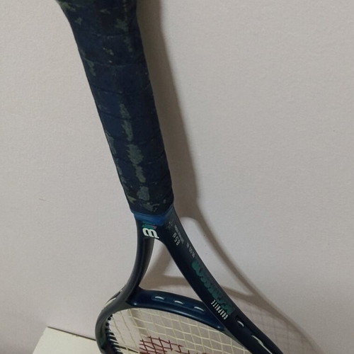 Wilson tennis racket used, handle needs repair