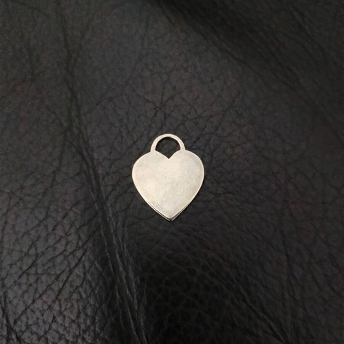 Three heart-shaped charms used, Swarovski crystal, mother of pearl, silver-plated