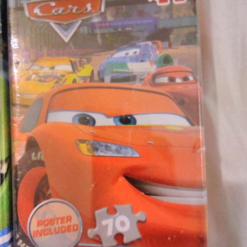 Disney puzzles new, pack of 4 with 70 pieces each