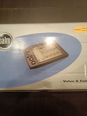Palm Pilot like new, complete with sealed instructions in box