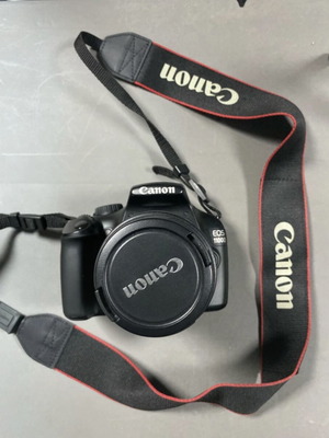 Canon EOS1100D camera like new with 18-55mm lens and accessories