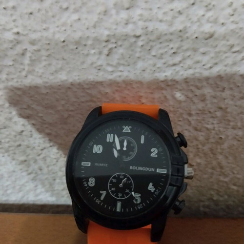 Watch orange with plastic strap like new