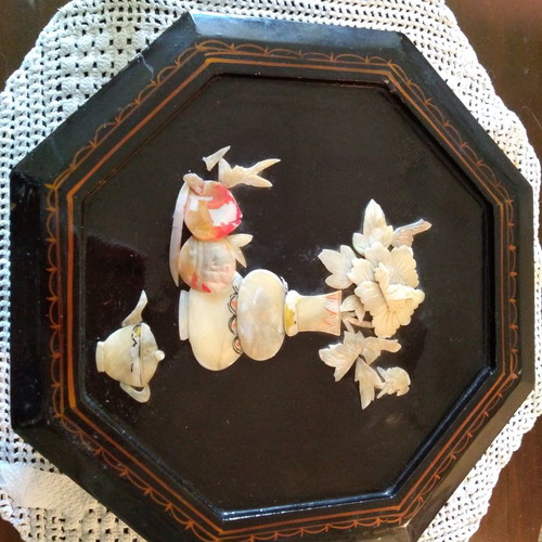 Wooden octagonal box used with shell decoration and red lacquer interior