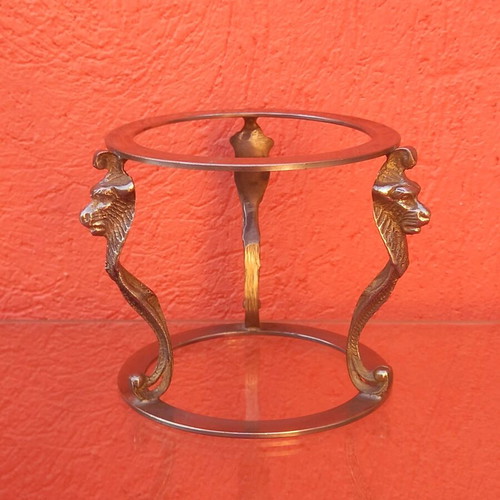 Brass base used with lion heads