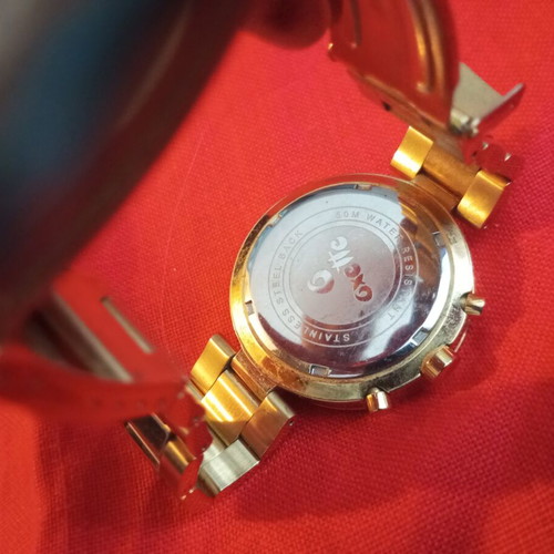 Oxette quartz stainless steel watch used, bronze tone bracelet