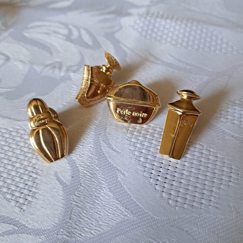 Avon collectible pins set of 4, like new, French perfumes
