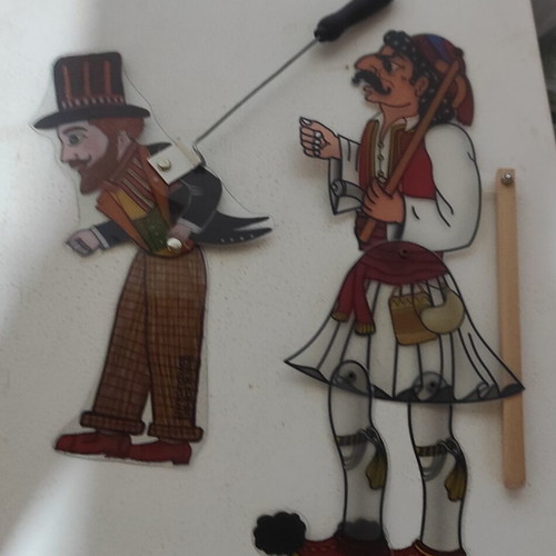 2 shadow theatre figures