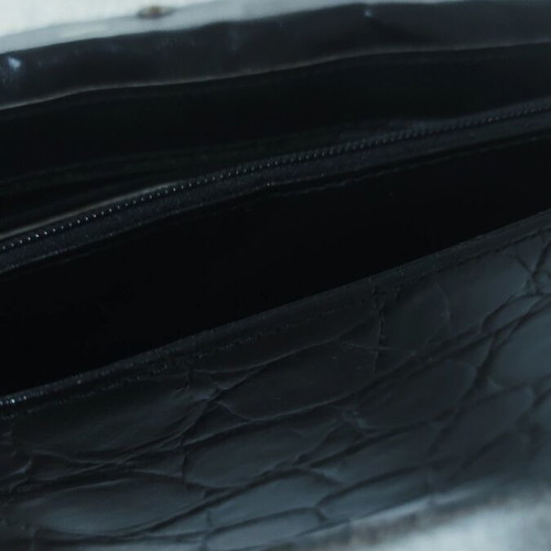 Vintage black leather handbag with crocodile texture and gold details