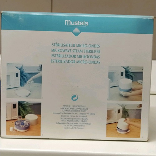 Mustela baby microwave sterilizer new with 4 biberon and nipples