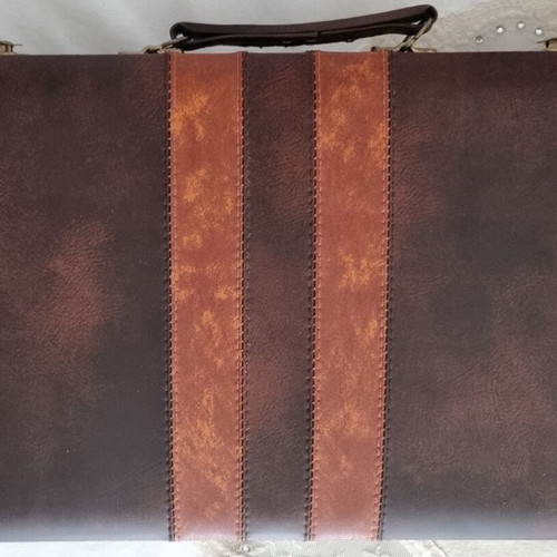 BACKBOARD IN A LEATHER CASE