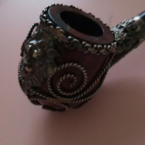 Wooden pipe with intricate silver decoration used