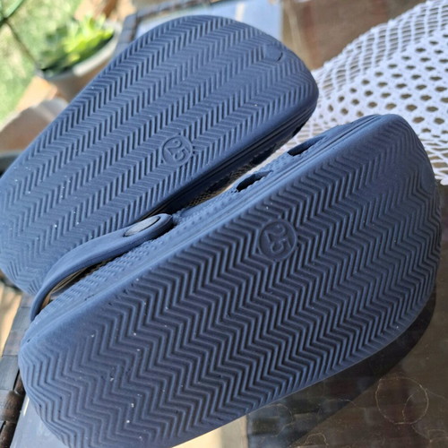 Kids Cros slippers size 25 like new, blue with fire truck figure