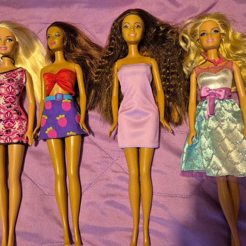 Barbie dolls used, various prices