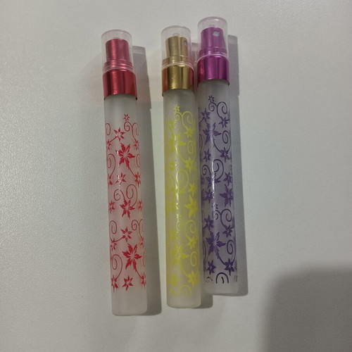 Perfume bottles set of 9 like new, travel size