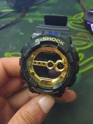 Casio G-Shock watch like new, black with gold dial