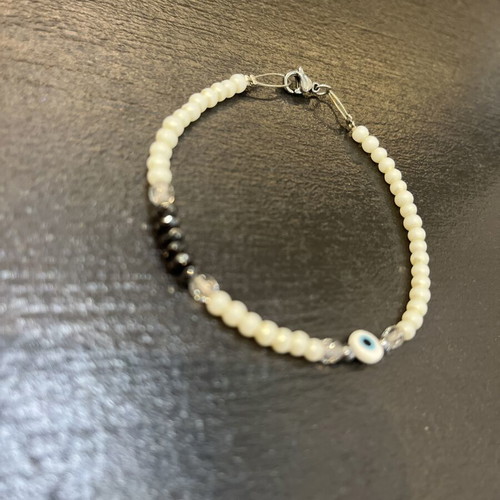 Handmade bracelet with beads, stainless steel clasp, like new, white
