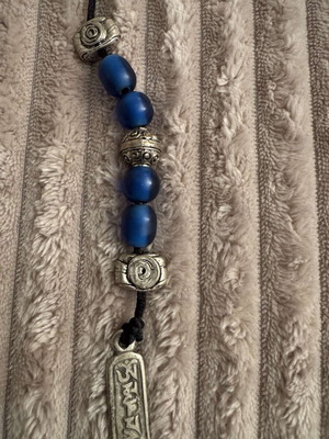 Vintage begleri with blue beads and decorative metal elements like new