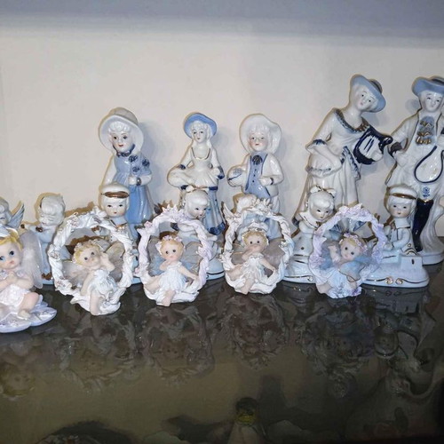 Porcelain decorative figures new, set of 15 pieces