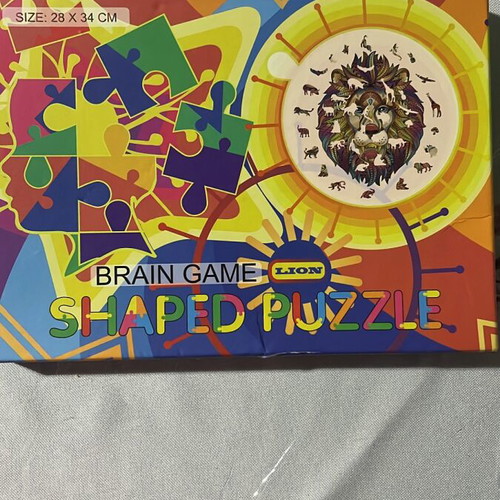 Shaped Puzzle Lion new, 28 x 34 cm